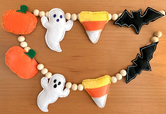 DIBY Club Halloween Garland. Features pumpkin, ghost, candy corn, and bat shapes. 