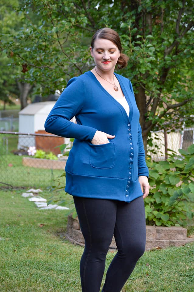The Grace Cardigan in tunic length with long sleeves. Features buttons and patch pockets. 