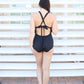 Back view of the Annette in black. Features adjustable cross-x back straps. 