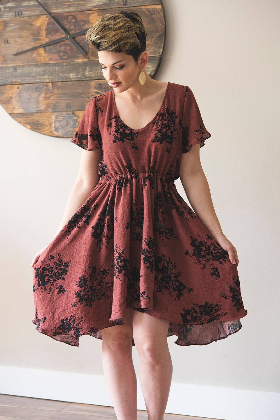 Sojourner Bias Dress with scoop neck and mid-thigh high-low hem. 