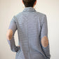 Back view of the Nora sweater with long sleeves, drawstring funnel neck, and elbow patches.  Misses size. 