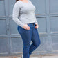 Woman wearing Bravado Boot leg jeans.