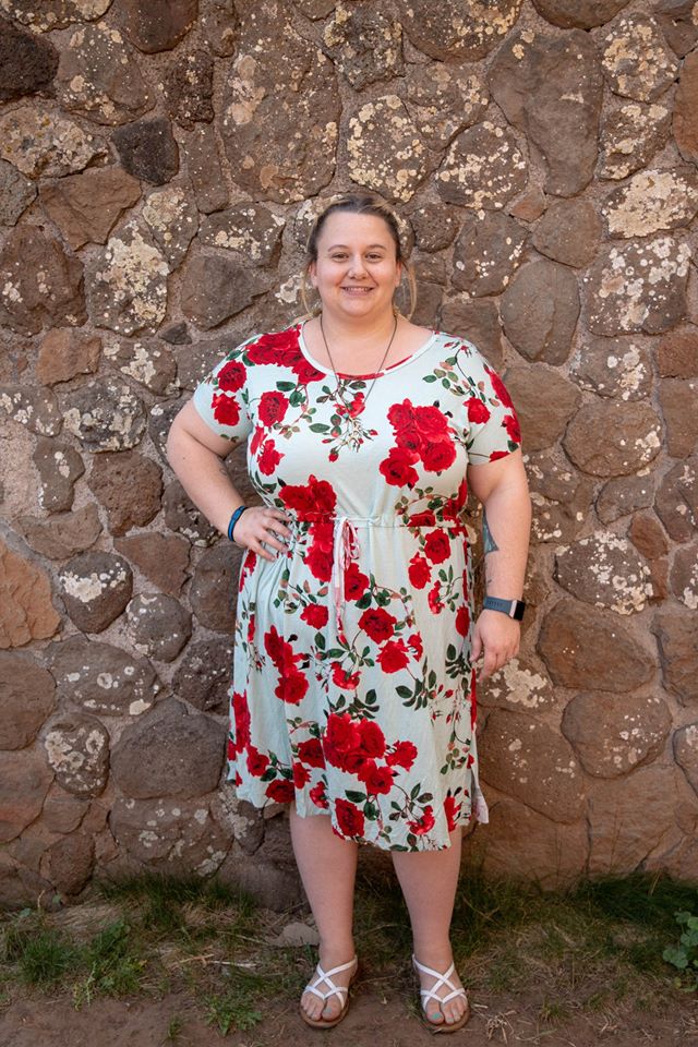 The Helen Dress in plus size. Features a solid front and knee-length skirt options. 