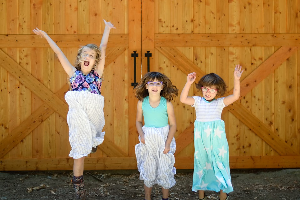 Three girls display their Samantha Gathered Dresses!