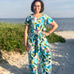 Stevie jumpsuit in misses size in a colorful geometric print. Features short sleeves, tie waist, and wide leg pattern options. 