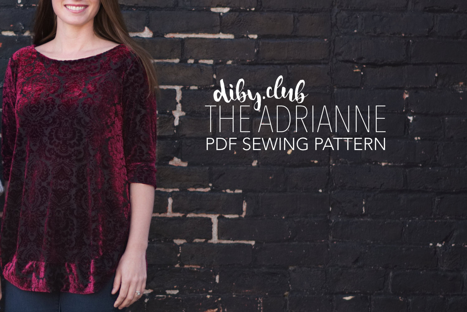Woman wearing 3/4 sleeve red crushed velvet DIBY Club Adrianne Sweater in front of a dark brick wall. Words read diby.club The Adrianne PDF Sewing Pattern
